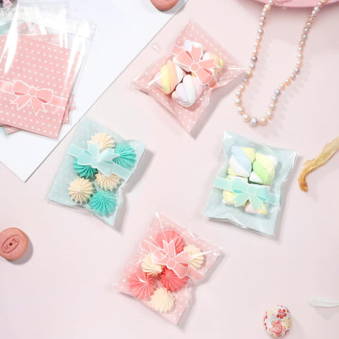 NUOMI 200Pcs Self Adhesive Pink Cookie Bags, Resealable Cellophane Bags for Gift Giving, 3.9"x3.1" with Bow Decoration