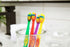 SmartSmile 72 21-542 Pcs Bulk Kids Toothbrushes Individually Wrapped - Assorted Colors with Animal Paw Prints - Popular