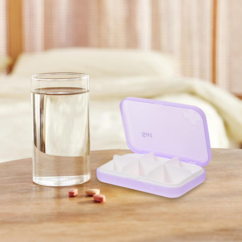 Portable Seven-Compartment Pill Organizer for Travel and Home Use