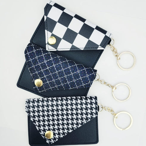Stylish Black and White Envelope-Shaped Keychain for Birth Control Pills