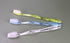 Disposable Toothbrushes Individually Wrapped with Toothpaste, Travel Toothbrush Set for Adults Kids, 30 Pack, 3 Colors