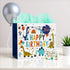 LEAYUGF 13.8" Large Dinosaur Gift Bag with Tissue Paper and Card For Kids Boys Birthday Dinosaur Themed Party Supplies