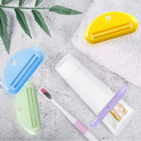 TKYZMS 4Pcs Toothpaste Squeezer,Plastic Toothpaste Tube Squeezer Toothpaste Dispenser Hanging Toothpaste Clip