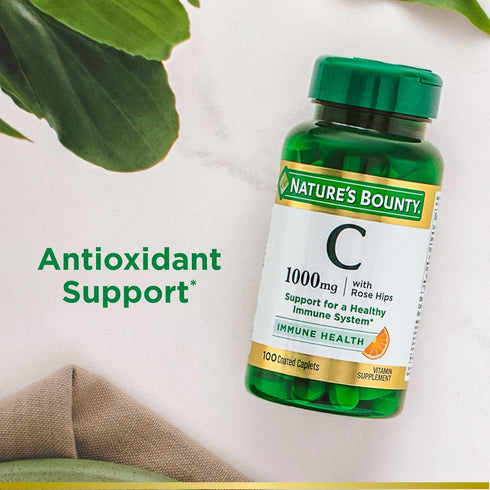 Nature's Bounty Vitamin C + Rose Hips, 1000mg, 100 Coated Caplets, Immune Support